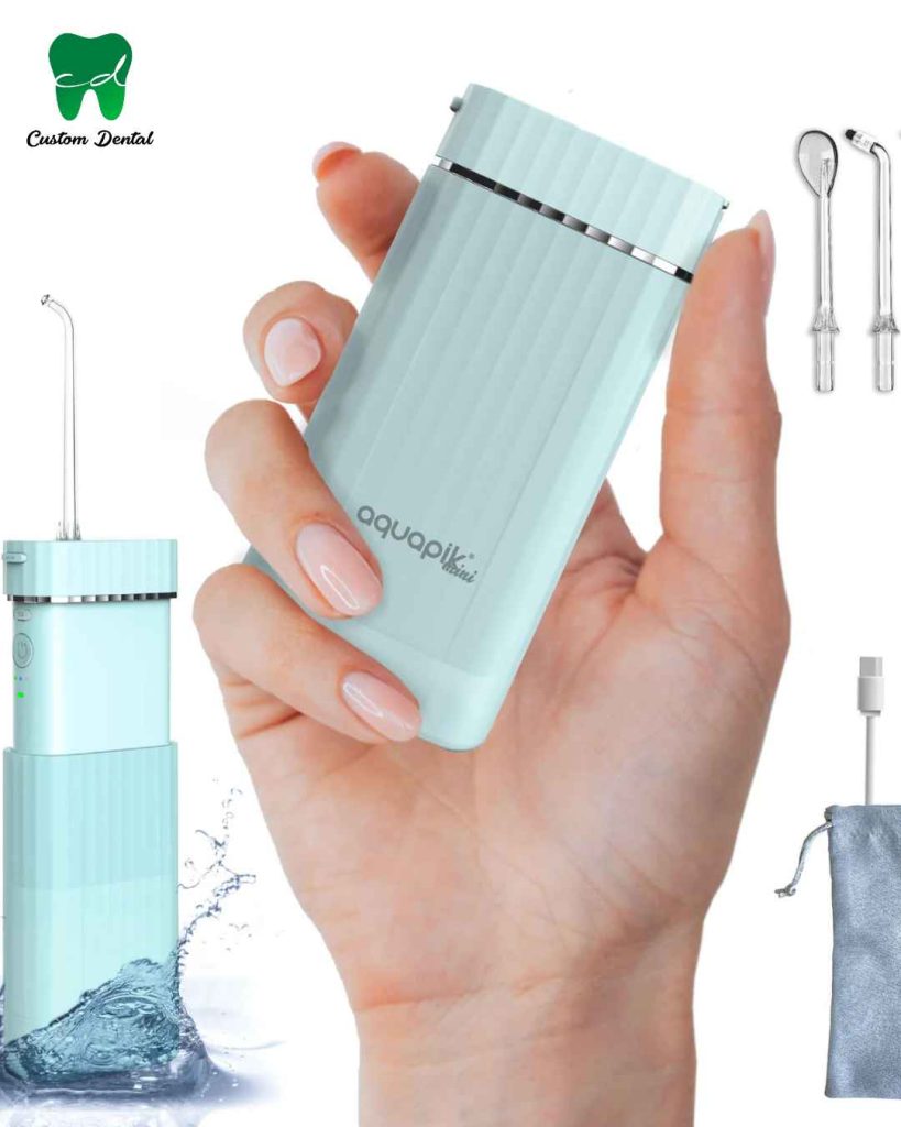 Cuidado bucal con irrigador bucal portátil. Fácil de llevar.